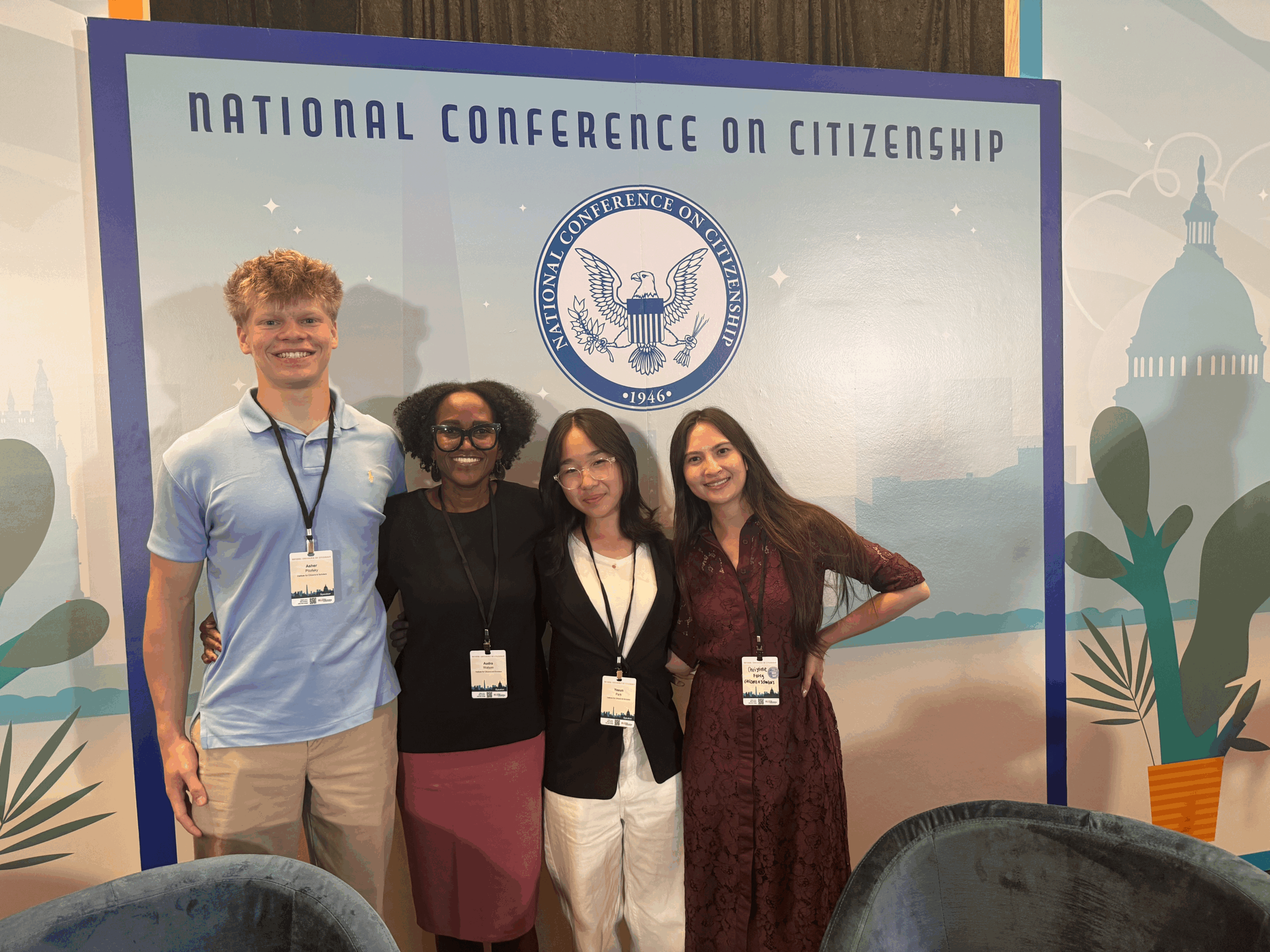 Group of people standing together smiling